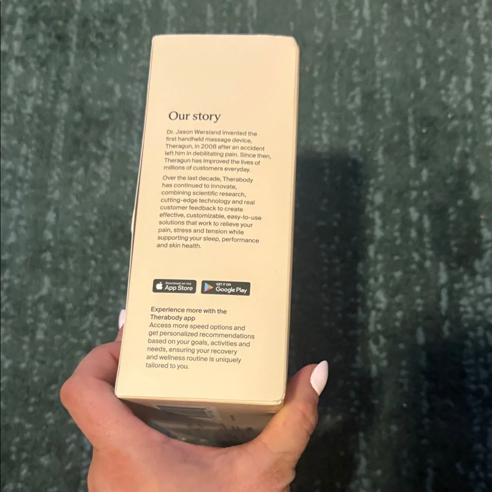 Therabody Theragun Mini - Cream Packaging with Black Device Image - Picture 2 of 4
